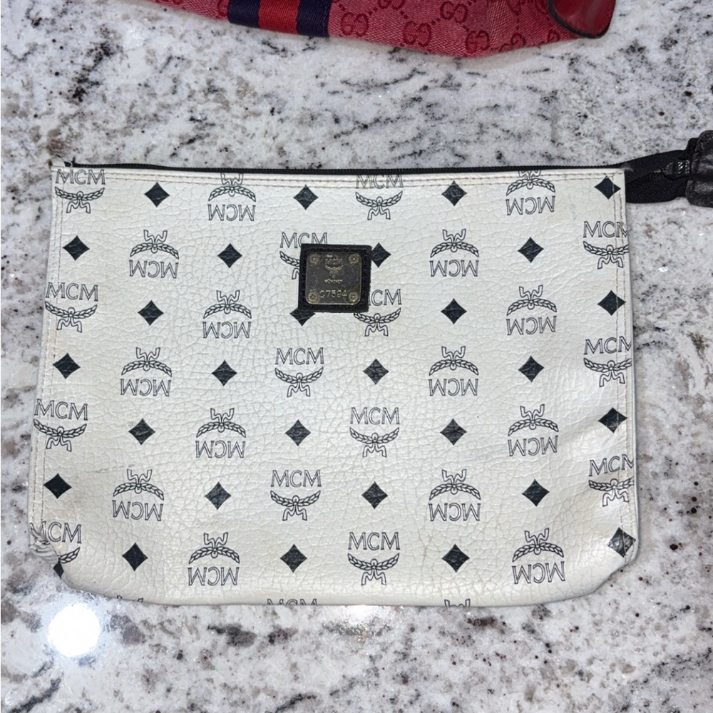 MCM White Pouch with Black Logo Pattern